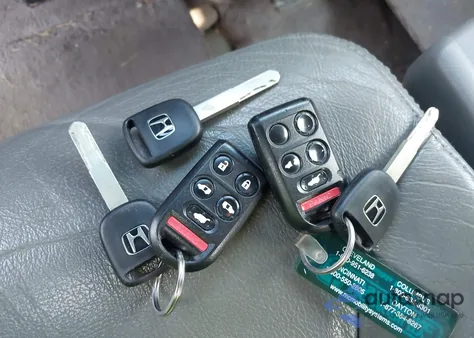 2010 Honda Odyssey Ex-L from USA, damaged, VIN 5FNRL3H79AB052697